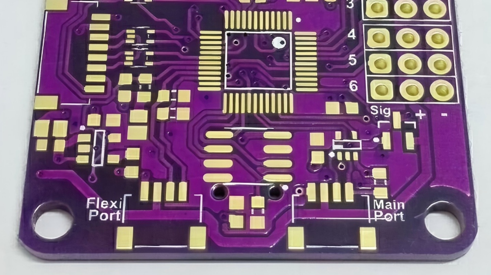 Precision PCB with purple solder mask, featuring gold-plated pads and high-density routing for small electronic modules