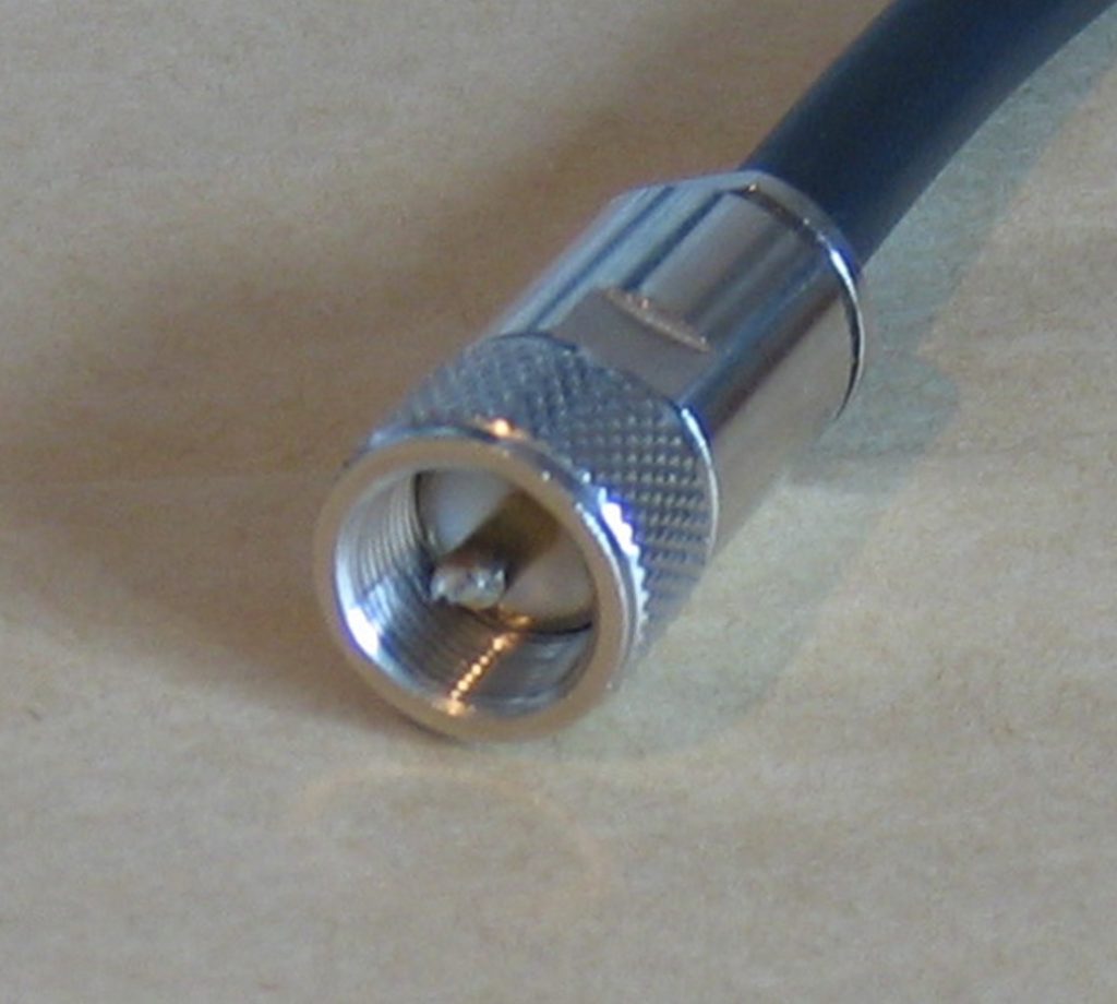 Close-up of a TNC RF connector male, with threaded structure, for high-frequency RF cables