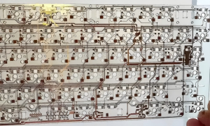Large-format glass-substrate PCB panel for keyboard devices, with dense copper traces and pads