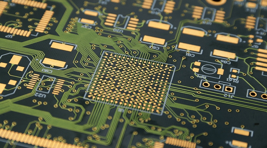 Close-up of HDI PCB BGA pad area, showing fan-out traces and microvia routing for high-density component integration.