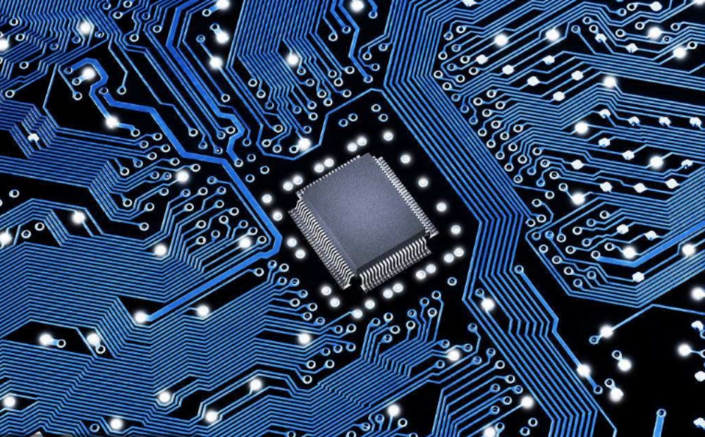 High-speed printed circuit board with IC chip, intricate PCB routing traces for electronic hardware